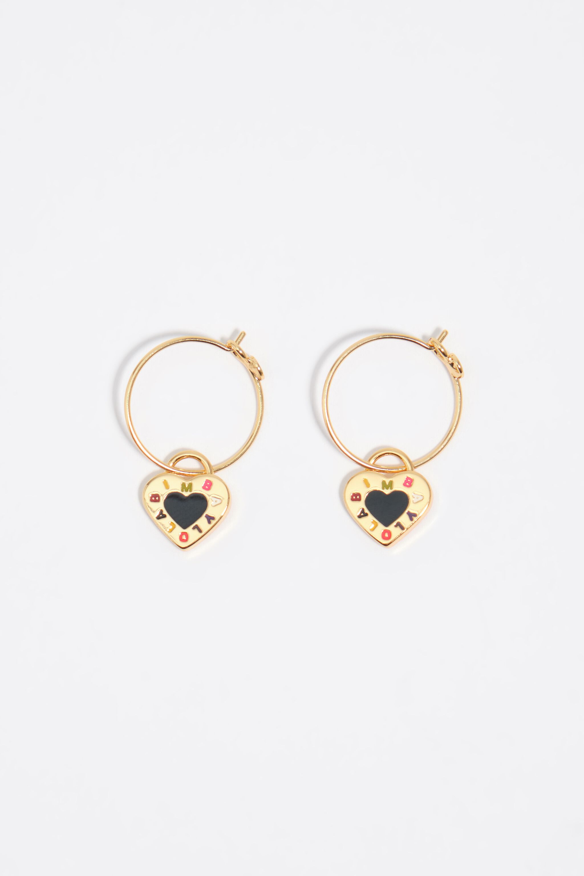 Aros de oreja con logo de corazón negro