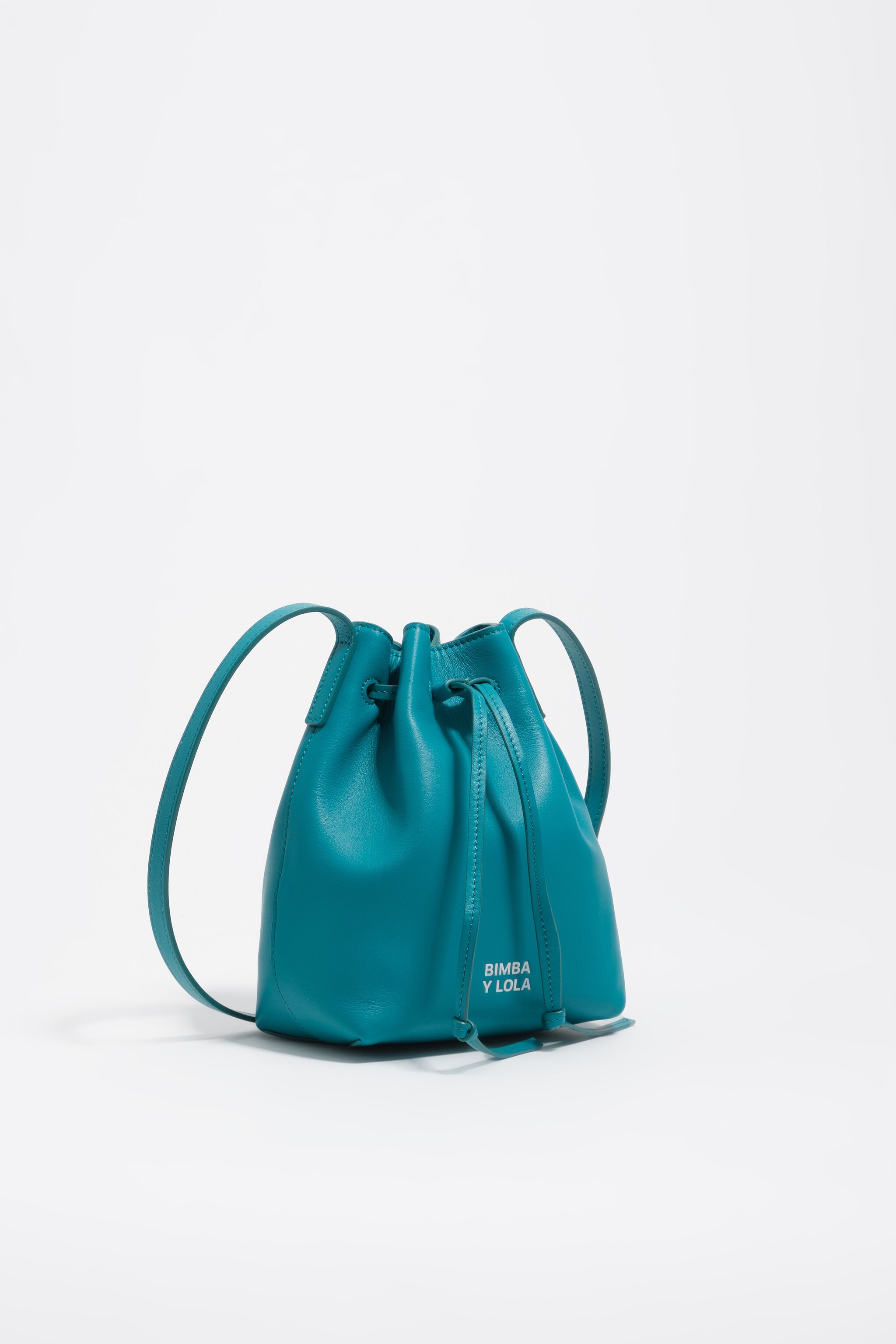 Bolso de mano pequeño de cuero verde tropical