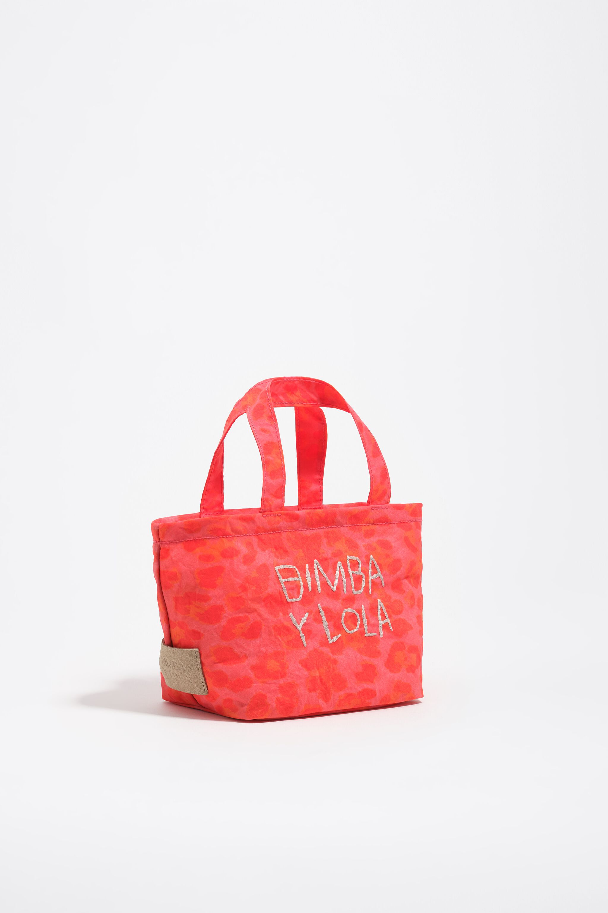 Bolso mini de nailon con estampado de leopardo rosa