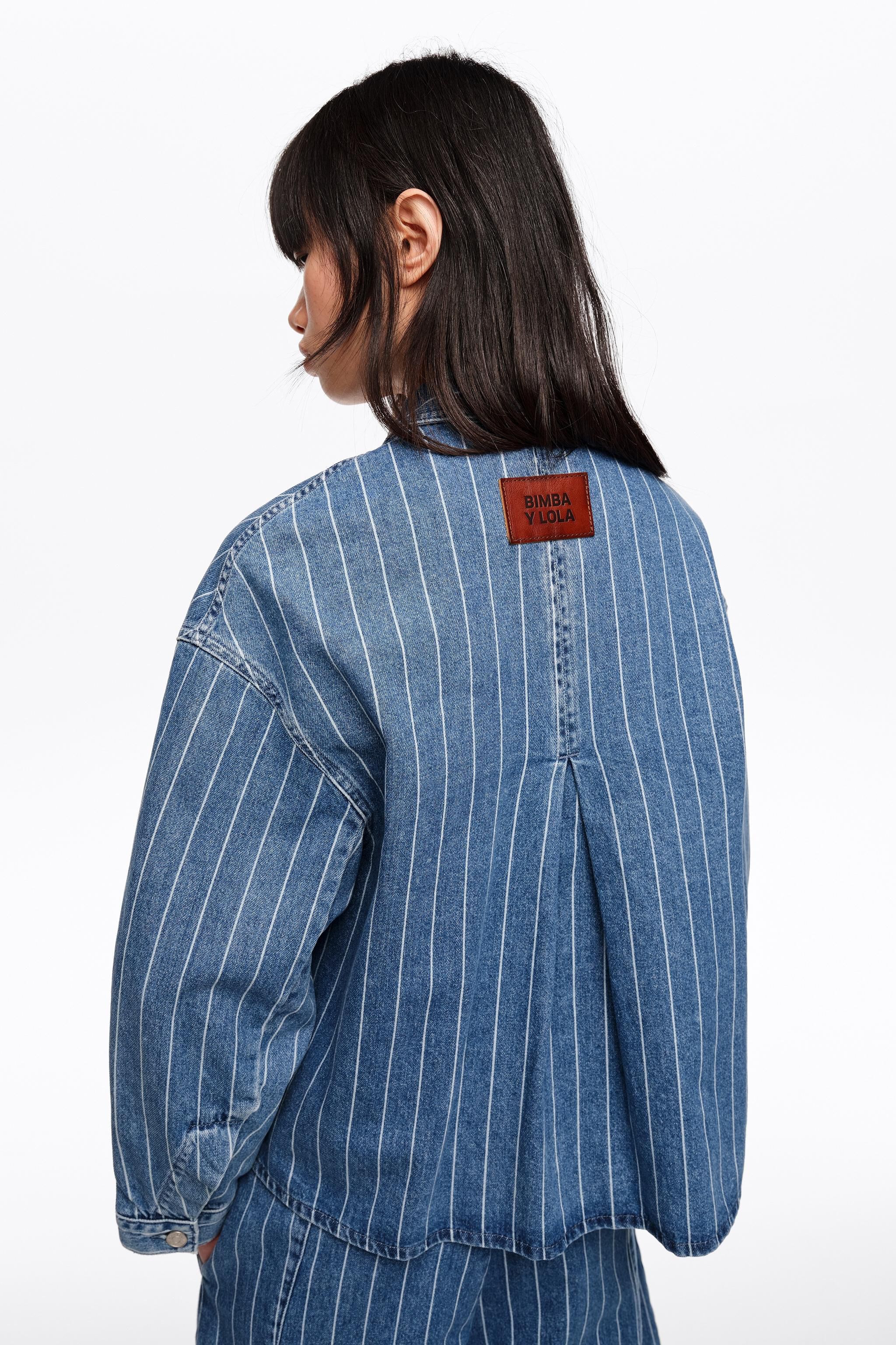 Chaqueta vaquera A-line desgastada con rayas azules