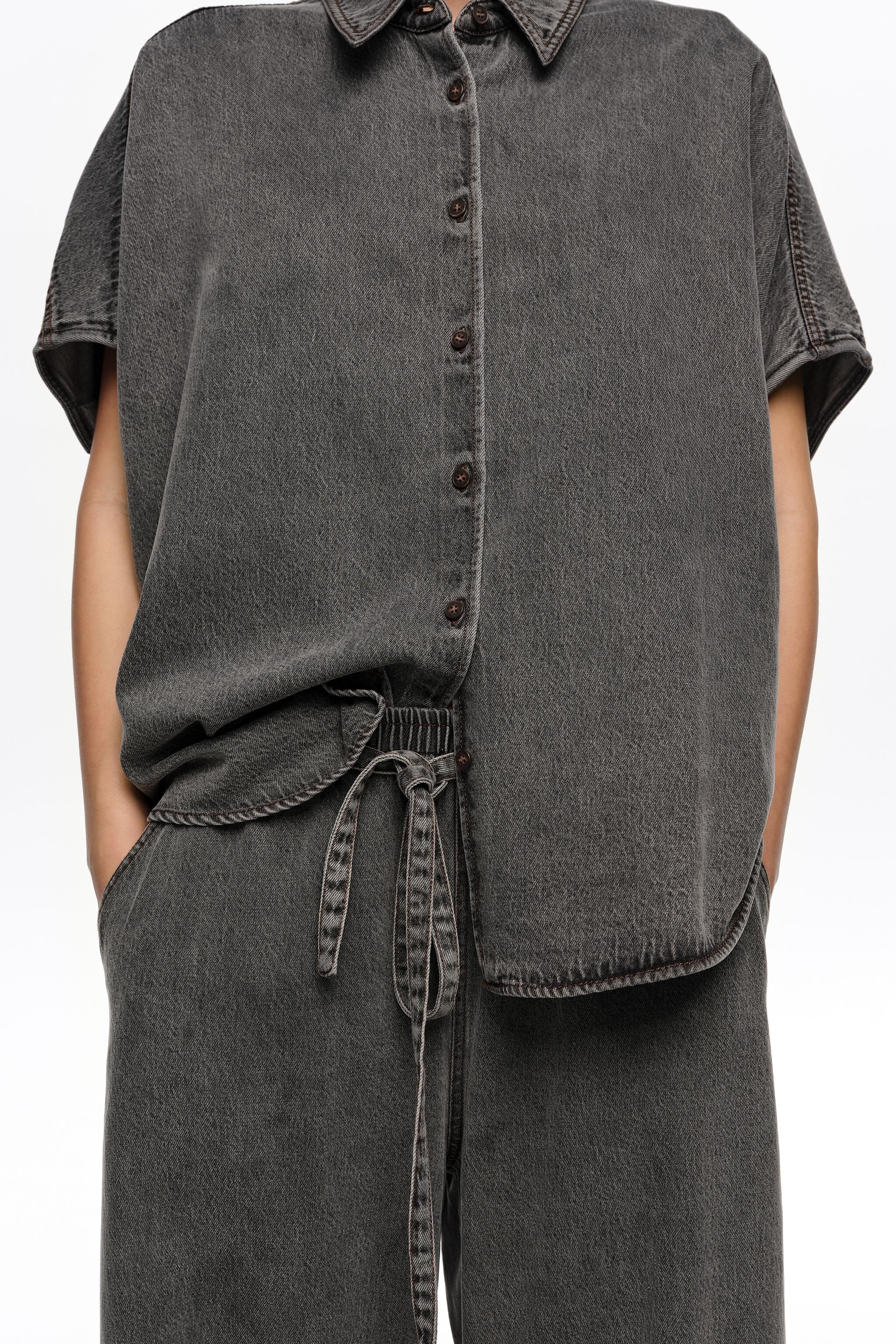 Pantalones jogger fluidos negros lavados
