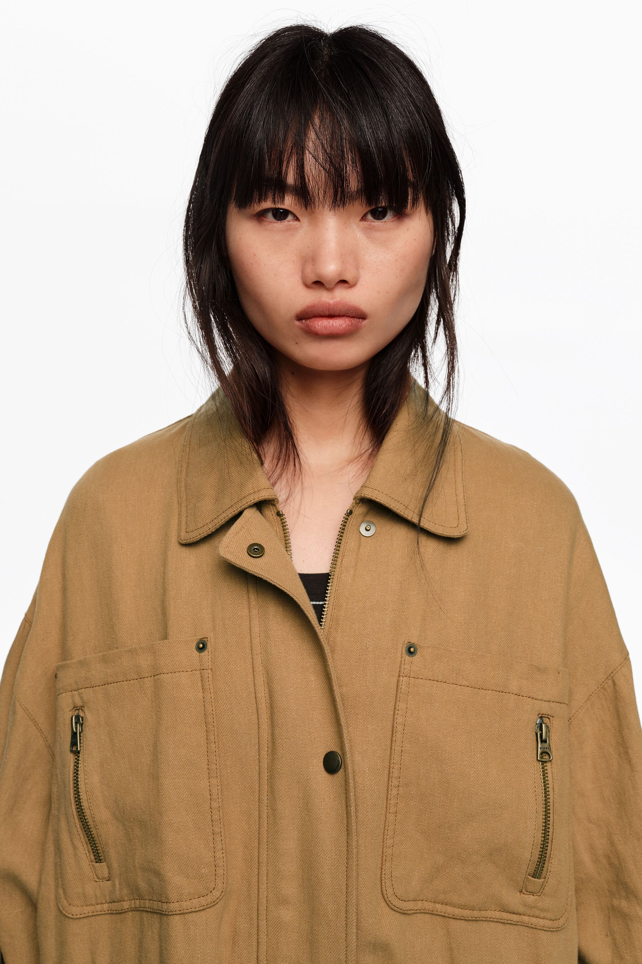Chaqueta de camello con cintura ajustable