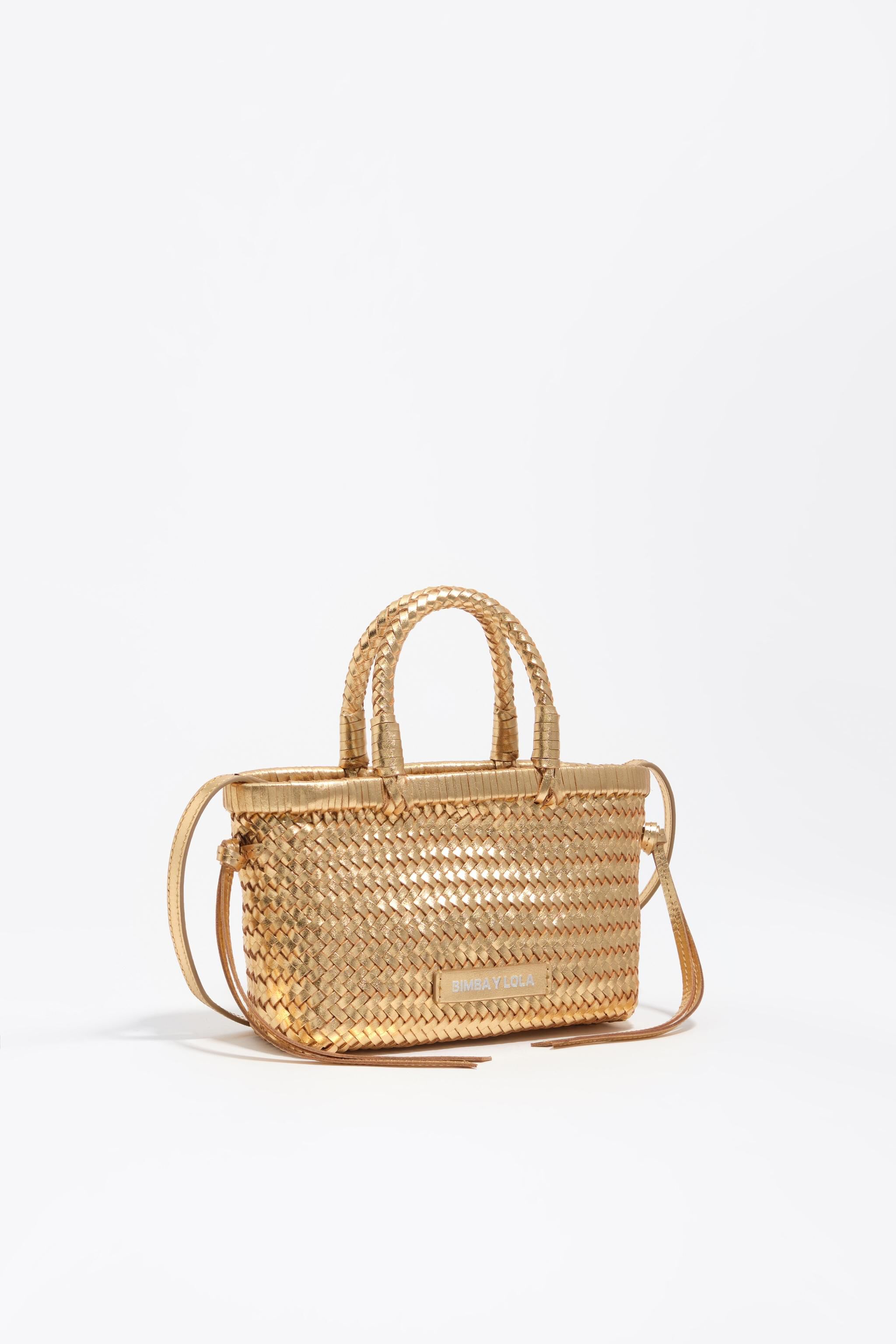 Bolso mini de cuero con trenza dorada
