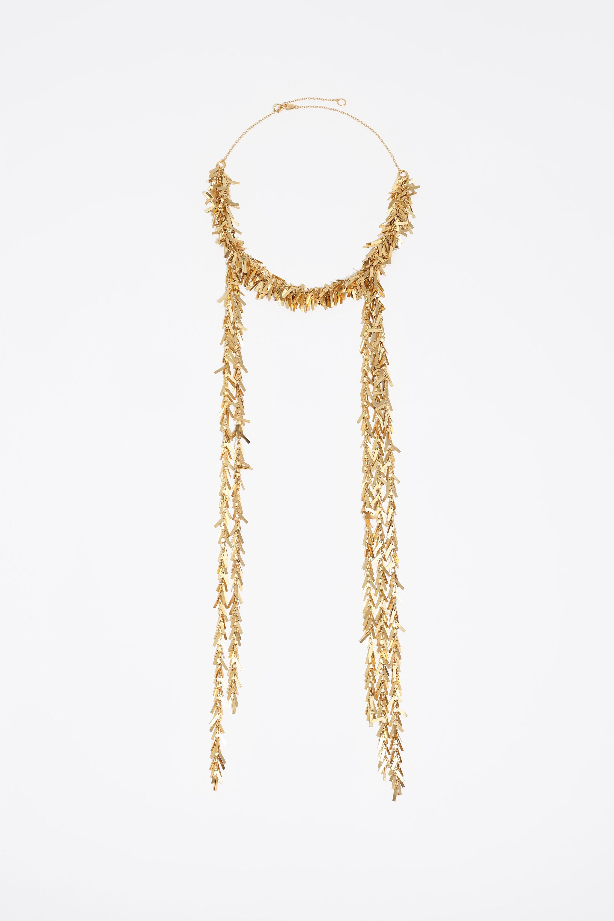 Collar de cadena de metal dorado envejecido con flecos