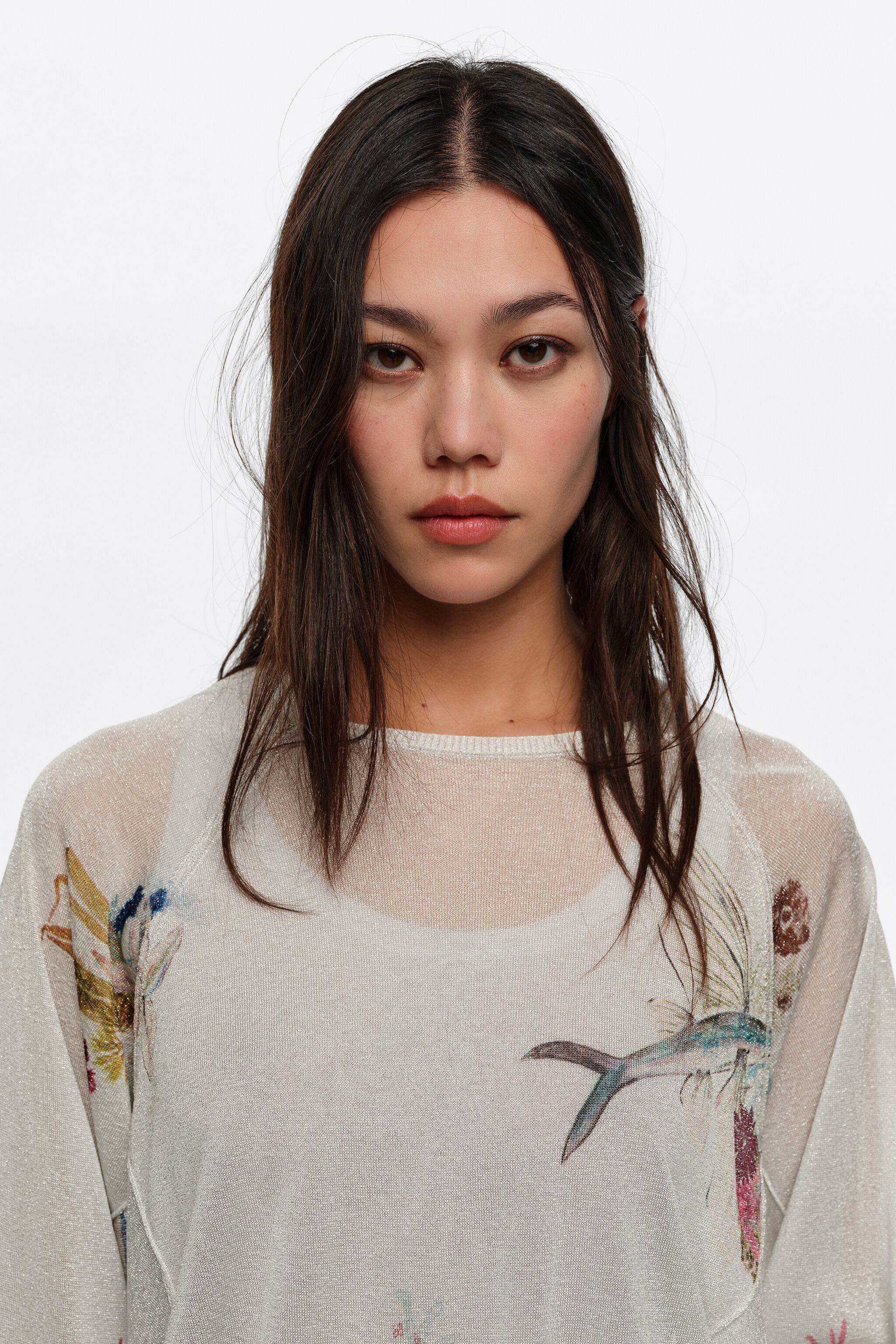 Sweater de manga en forma de ala de color marfil con hilo lurex