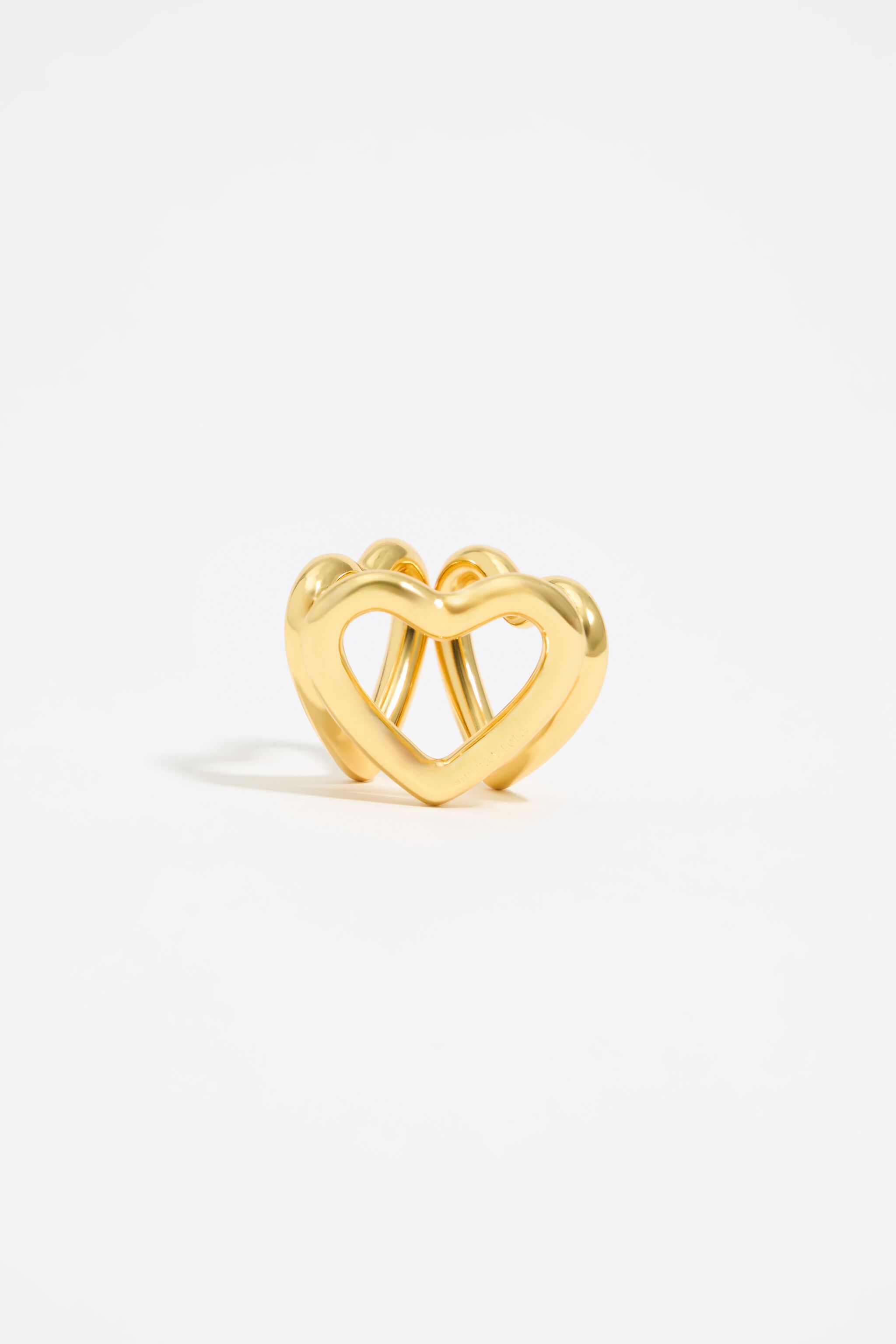 Anillo para bufanda con corazones dorados