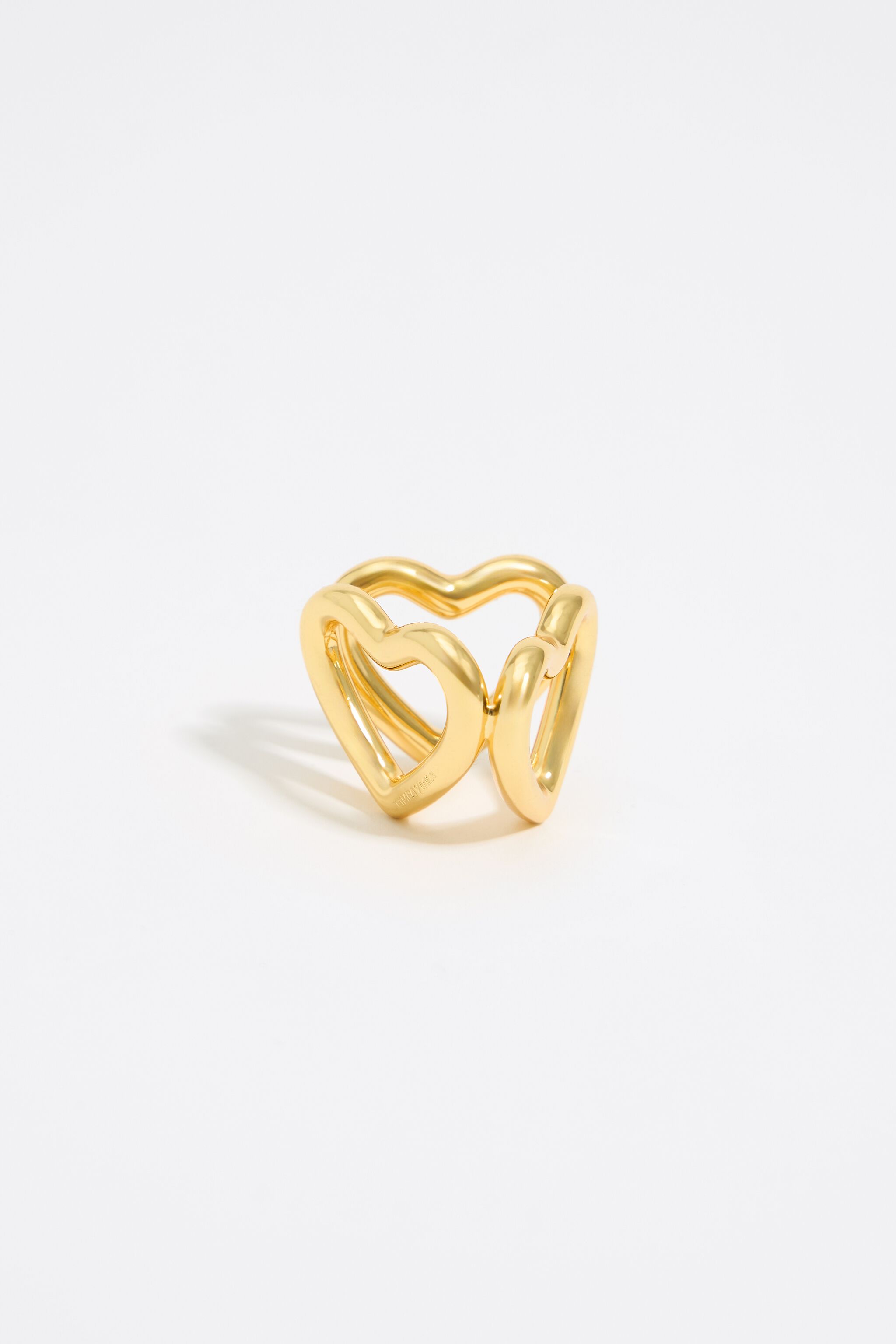Anillo para bufanda con corazones dorados