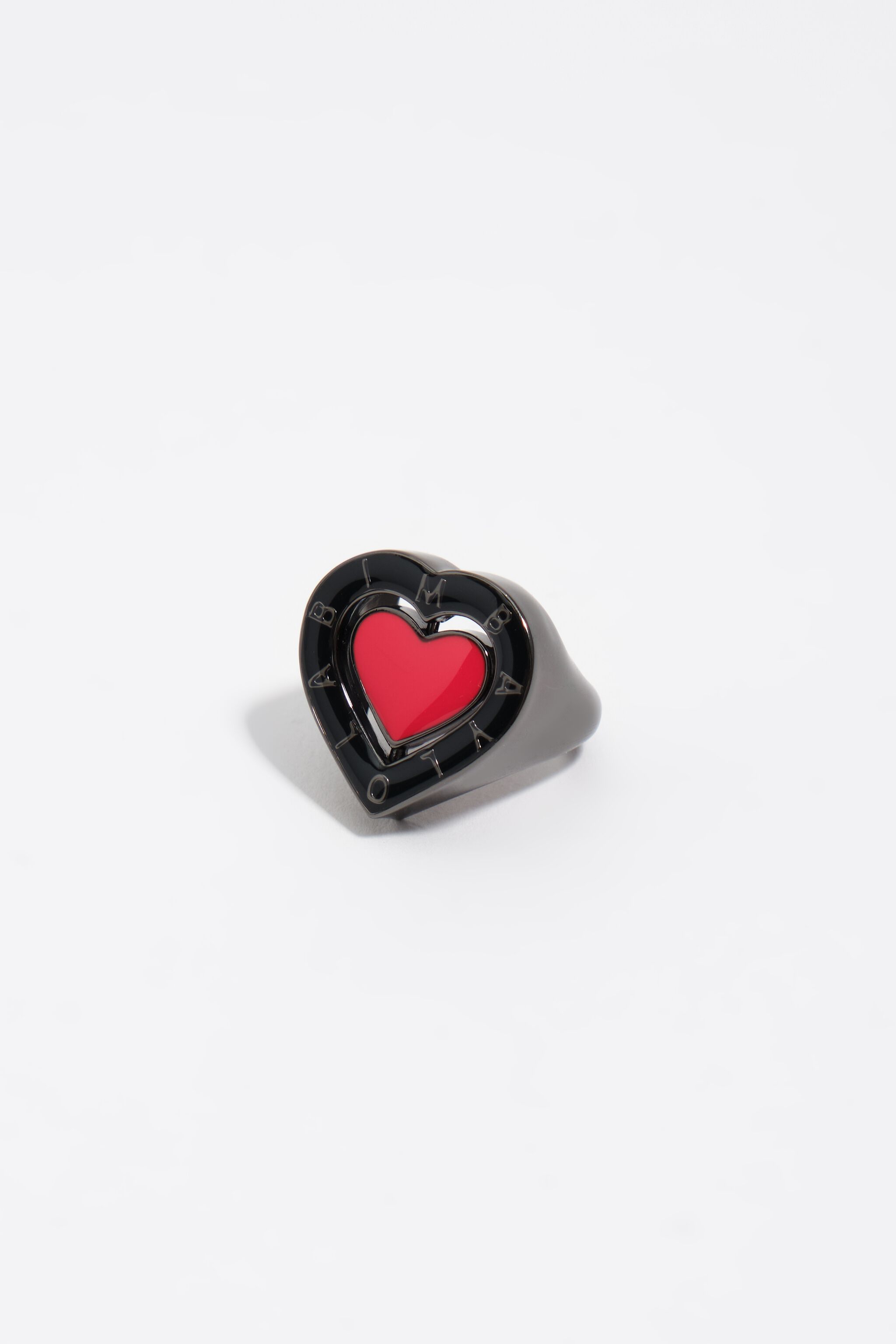 Anillo con logotipo de corazón giratorio negro