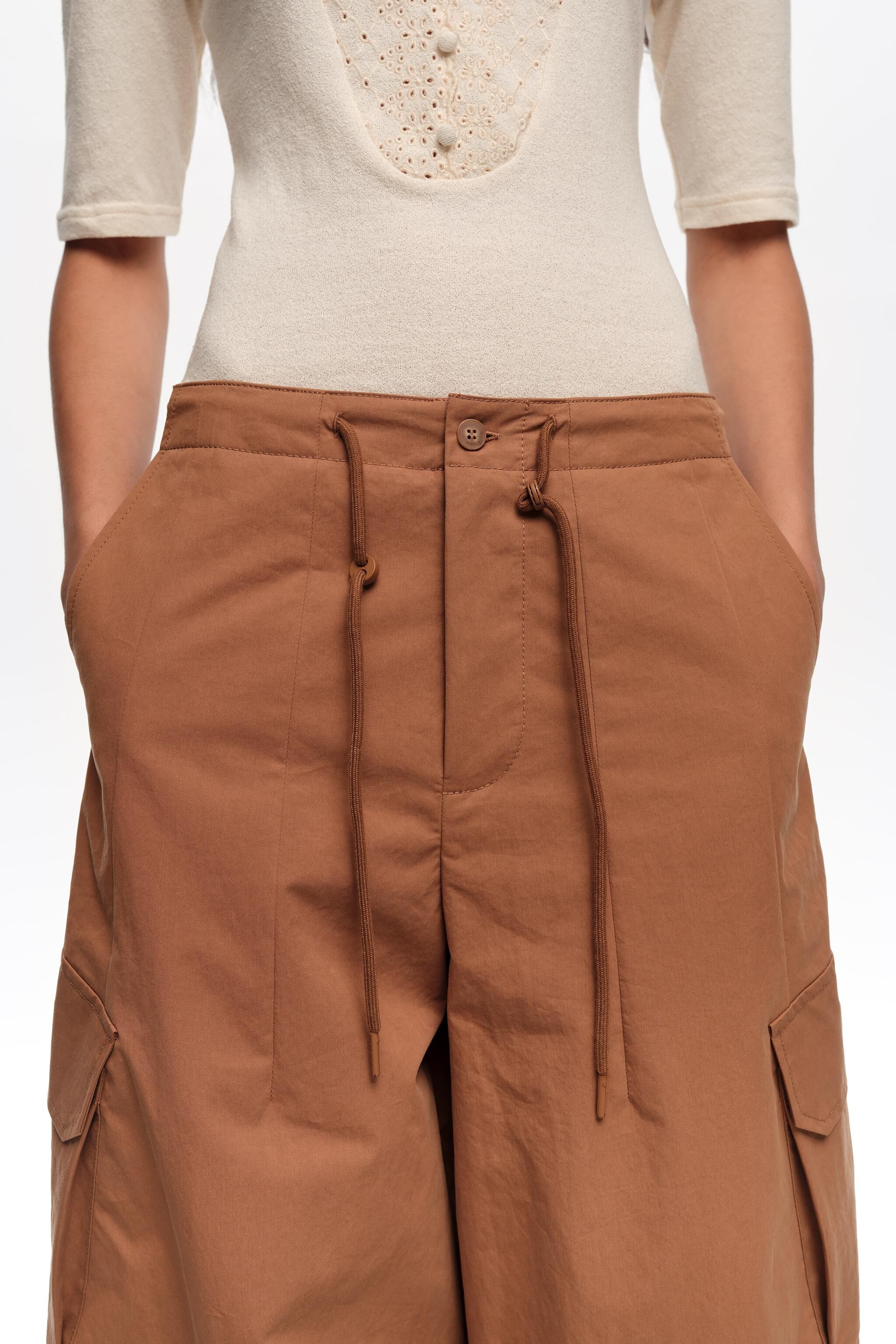 Pantalones de tela de algodón marrón claro