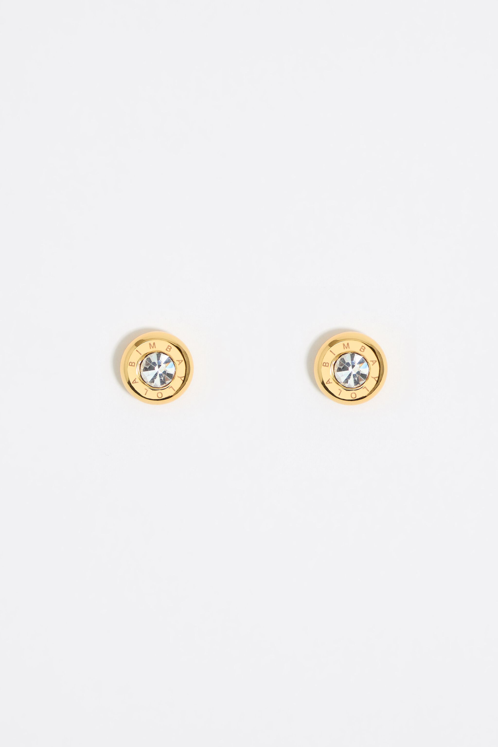 Auriculares de oro con logotipo y cristal