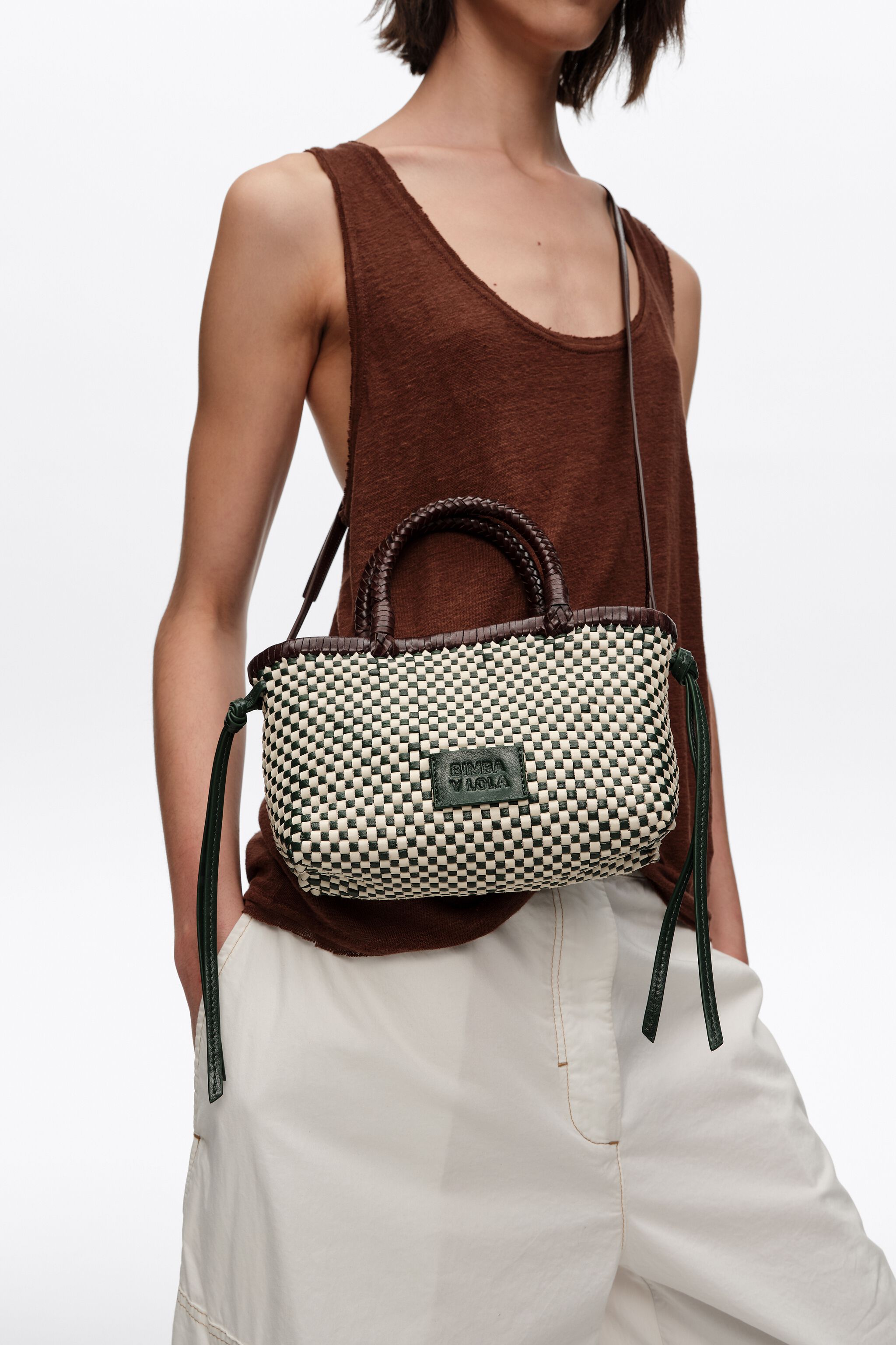 Bolso de cuero trenzado verde oscuro