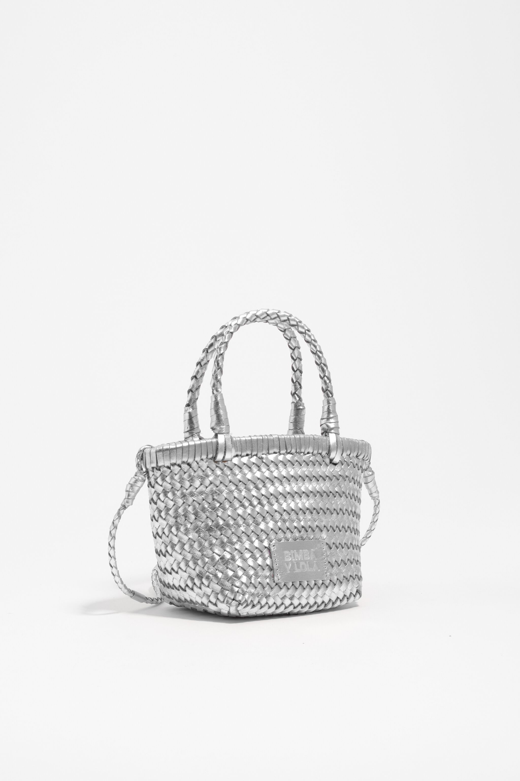 Bolso mini de cuero con trenza plateada