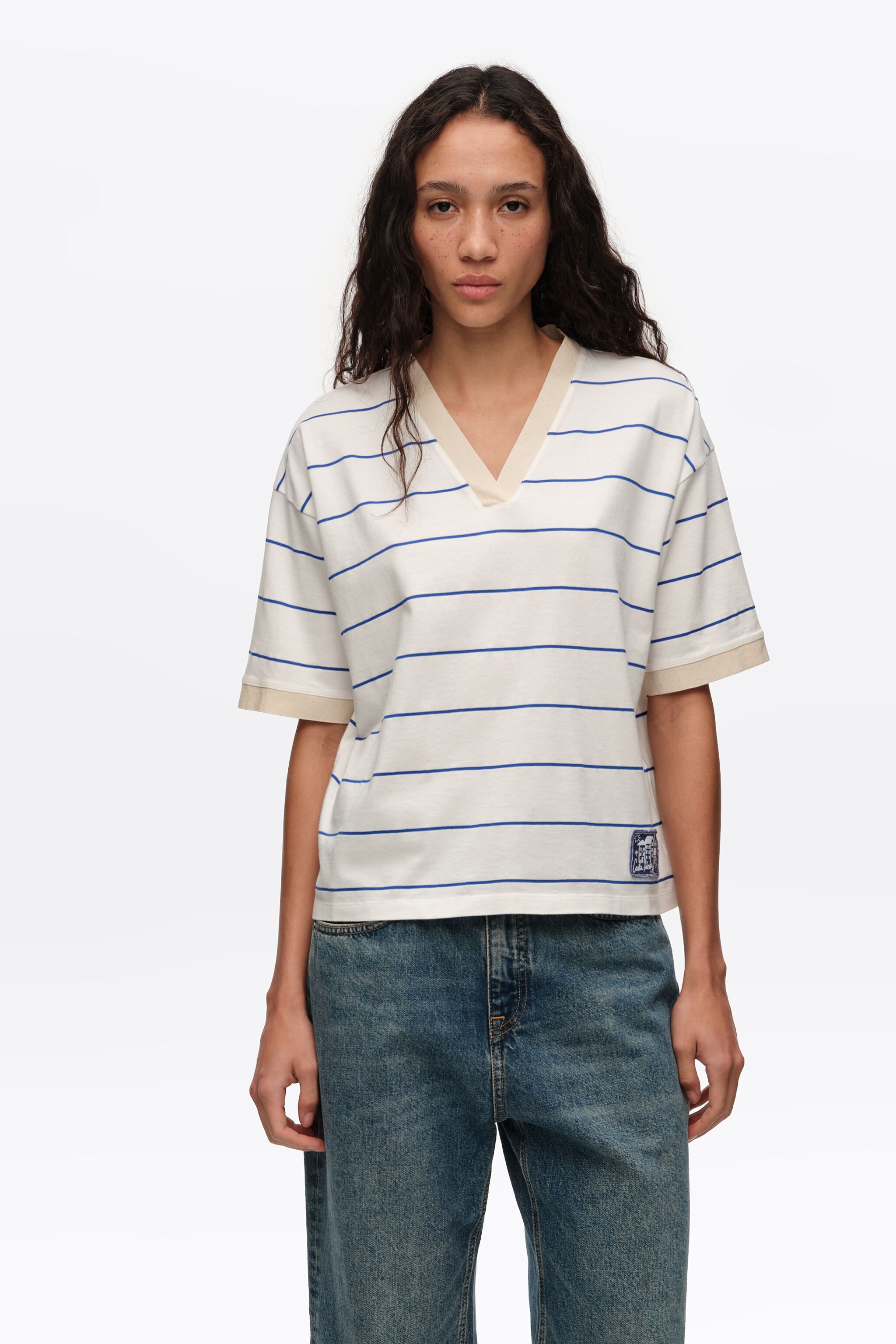 Camiseta de algodón con rayas blancas