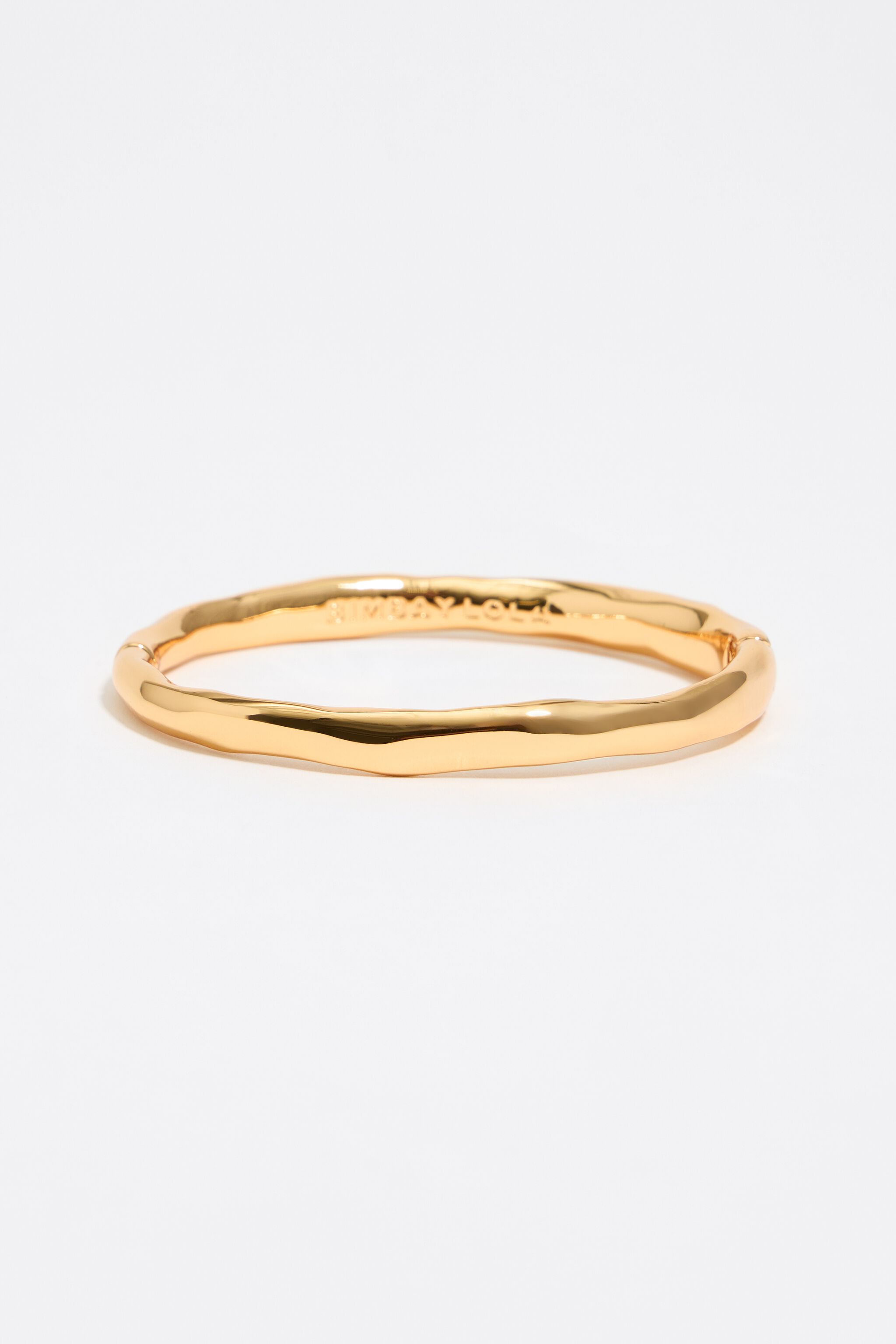 Brazalete irregular con tono dorado