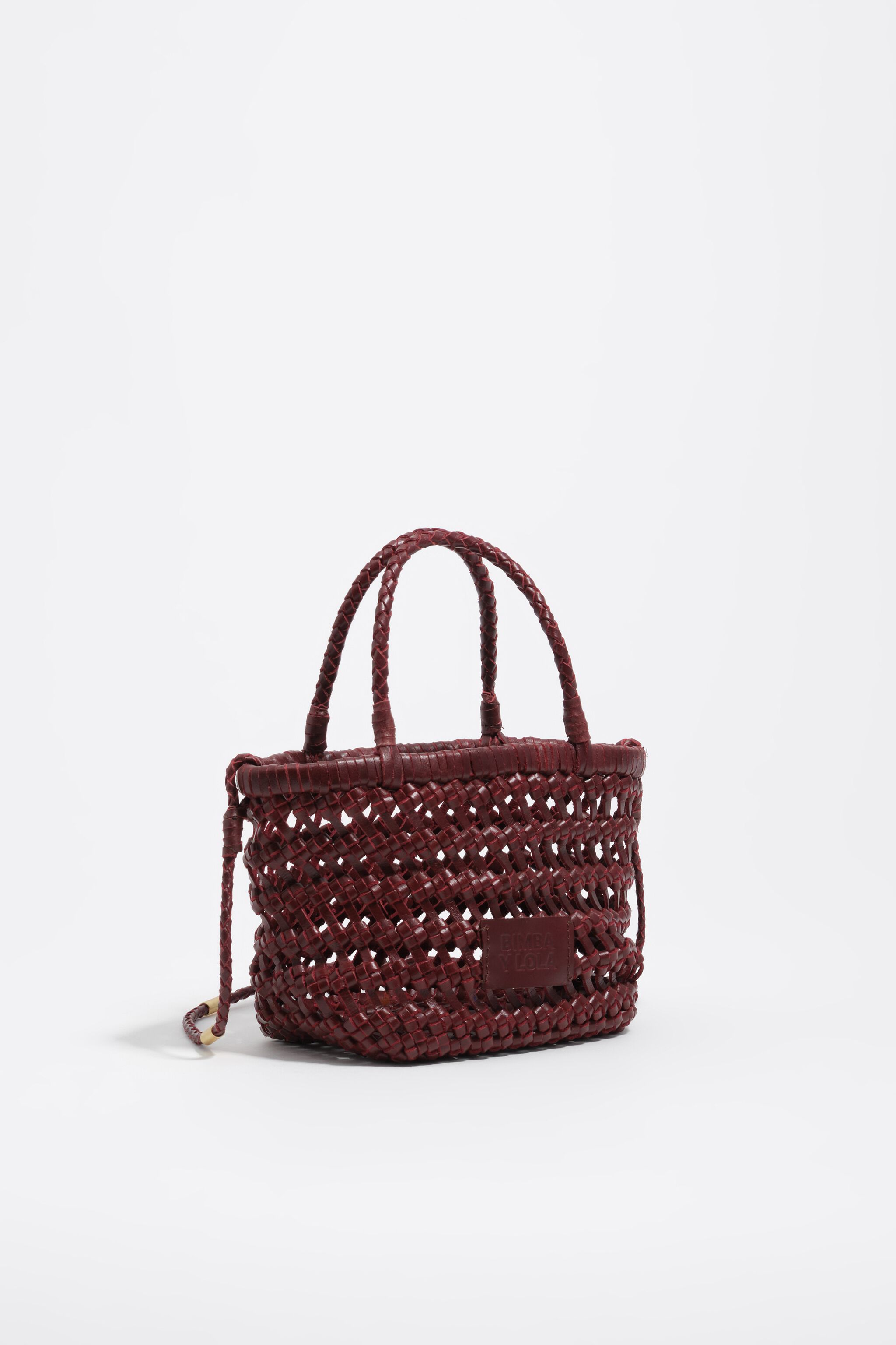 Bolso mini de cuero con trenzado de cereza oscura